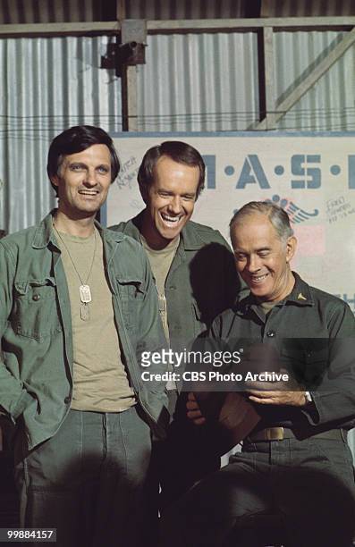 Portrait of American actors, from left, Alan Alda, as Captain Benjamin Hawkeye Pierce, Mike Farrell, as Captain B.J. Hunnicut, and Harry Morgan, as...