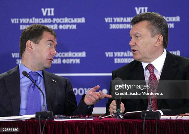 Russian President Dmitry Medvedev speaks with his Ukrainian counterpart Viktor Yanukovych during the seventh Ukraine - Russia Economic Forum in Kiev,...