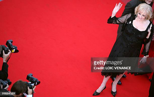 French actress Michele Mercier arrives for the screening of "Des Hommes et des Dieux" presented in competition at the 63rd Cannes Film Festival on...