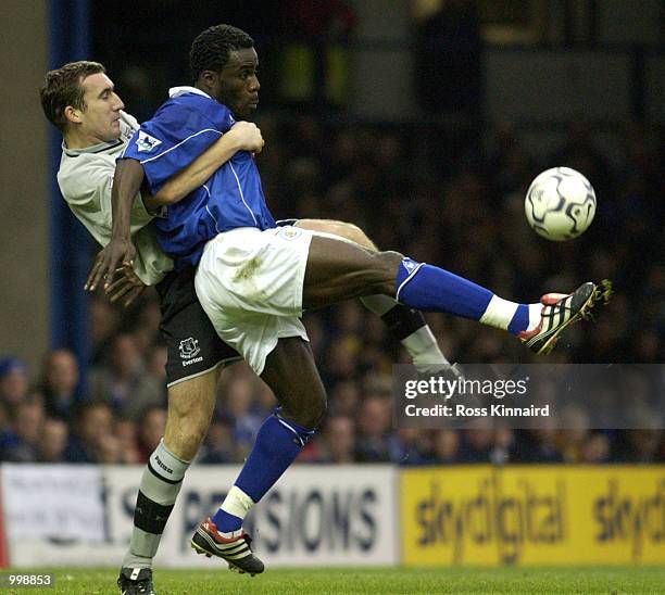 Ade Akinbiyi of Leicester is challenged by Alan Stubbs of Everton during the Leicester City v Everton FA Barclaycard Premiership match at Filbert St,...