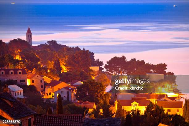 town of bol sunrise waterfront view - bol foto e immagini stock