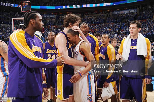 Pau Gasol of the Los Angeles Lakers hugs Russell Westbrook of the Oklahoma City Thunder at the end of Game Six of the Western Conference...