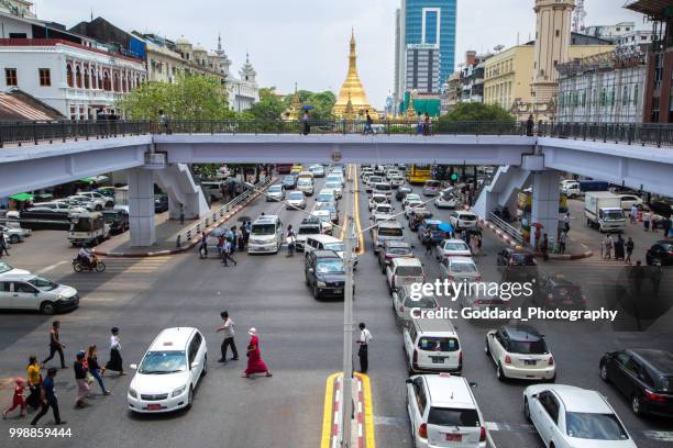 myanmar: elevated walkway - sule pagoda stock pictures, royalty-free photos & images