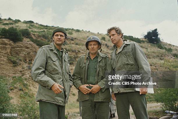 From left, American actors Alan Alda, as Captain Benjamin Hawkeye Pierce, Larry Linville , as Major Frank Burns, and Wayne Rogers, as Captain Trapper...