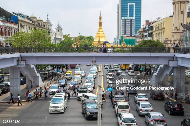 myanmar: elevated walkway - sule pagoda stock pictures, royalty-free photos & images