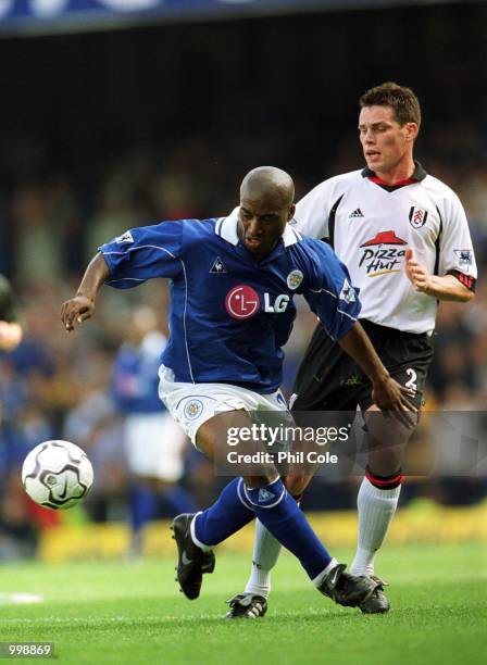Steve Finnan of Fulham tries to tackle Dean Sturridge of Leicester during the FA Barclaycard Premiership match between Leicester and Fulham at...