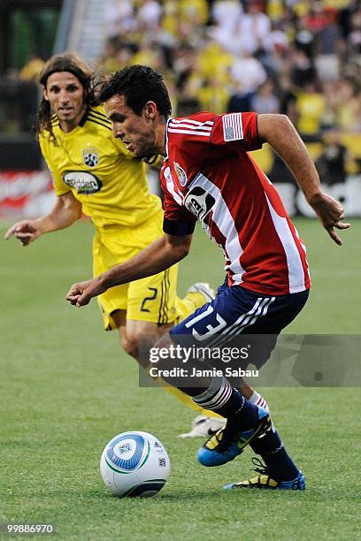 Jonathan Bornstein of Chivas USA controls the ball in front of Frankie Hejduk of the Columbus Crew on May 15, 2010 at Crew Stadium in Columbus, Ohio.