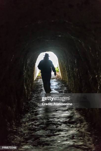 the cave - mining hats stock pictures, royalty-free photos & images