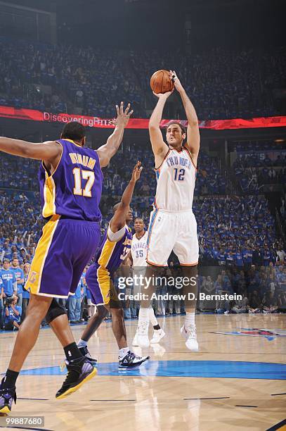 Nenad Krstic of the Oklahoma City Thunder shoots a jump shot against Andrew Bynum of the Los Angeles Lakers in Game Six of the Western Conference...