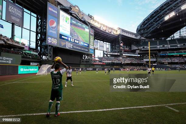 Luis Montes of Club Leon takes a throw-in in the first half against CF Pachuca at Miller Park on July 11, 2018 in Milwaukee, Wisconsin.