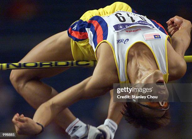 Loo Kum Zee of Malaysia scales the height during the Men's High Jump of the Track and Field event held at the National Stadium, Bukit Jalil, Kuala...