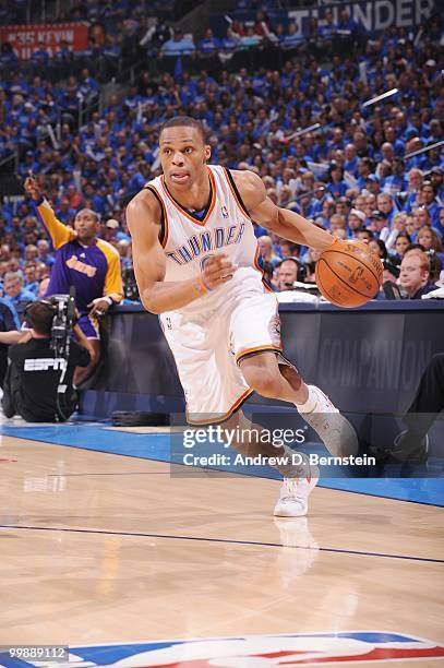 Russell Westbrook of the Oklahoma City Thunder dribbles against the Los Angeles Lakers in Game Six of the Western Conference Quarterfinals during the...