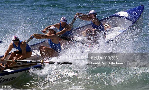 The Ballina crew crash through a wave during the Kellogg's Nutri-Grain Surf League NSW Surfboat Trials held at Narrabeen Beach in Sydney, Australia....