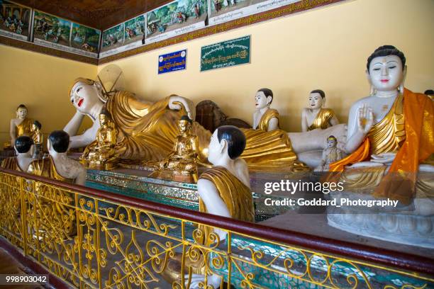 myanmar: shwedagon pagoda - reclining buddha statue stock pictures, royalty-free photos & images