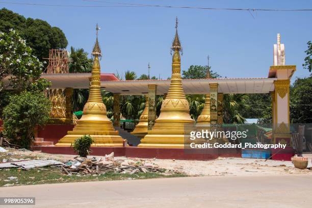 myanmar: kyaik pun pagoda in bago - bago stock pictures, royalty-free photos & images