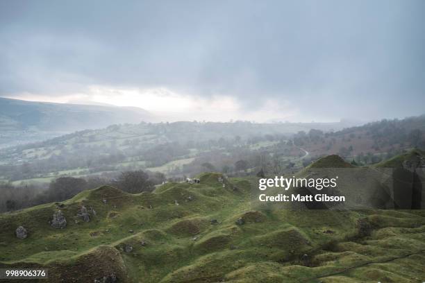 old abandoned quarry in wales reclaimed by nature to create beau - beau stock pictures, royalty-free photos & images