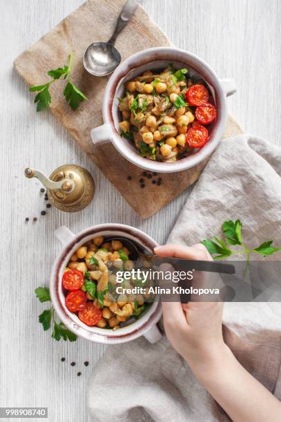 oriental salad with chick-pea and eggplants in two portions - oriental stock pictures, royalty-free photos & images