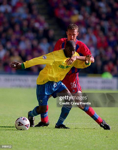 Steve Vickers of Palace hassles Bruce Dyer of Barnsley during the Nationwide Division One match between Crystal Palace and Barnsley at Selhurst Park...