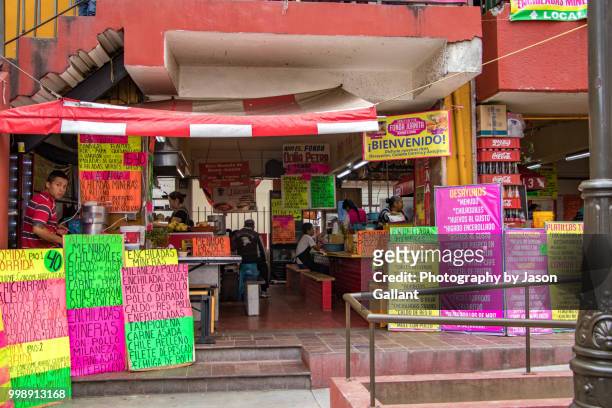 many restaurant signs outside the market in guanajuato - guanajuato state stockfoto's en -beelden