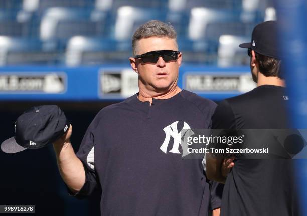 Third base coach Phil Nevin of the New York Yankees during batting practice before the start of MLB game action against the Toronto Blue Jays at...