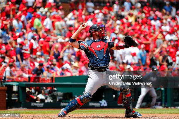 Tyler Flowers of the Atlanta Braves throws against the St. Louis Cardinals at Busch Stadium on July 1, 2018 in St. Louis, Missouri.