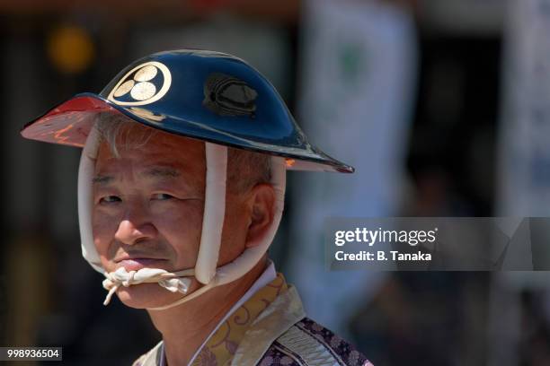 gentleman in kabuto helmet at sanja festival parade in the downtown asakusa district of tokyo, japan - sanja festival stock pictures, royalty-free photos & images
