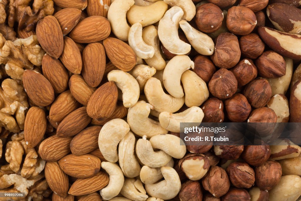 Mixe of various nuts background above closeup