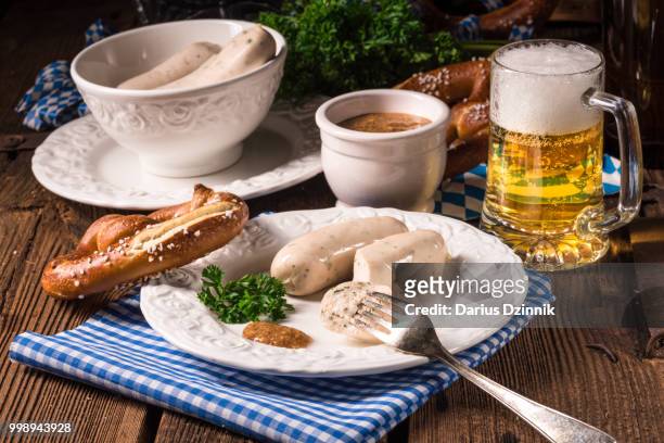 bavarian sausage with pretzel, sweet mustard and beer - mustard stock-fotos und bilder
