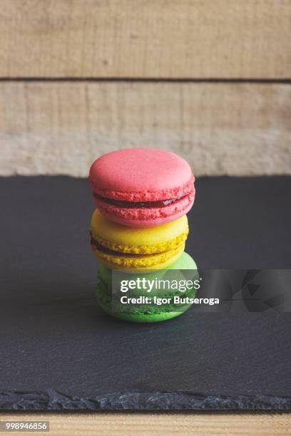 several different colored macaroons - coconut macaroons stock pictures, royalty-free photos & images