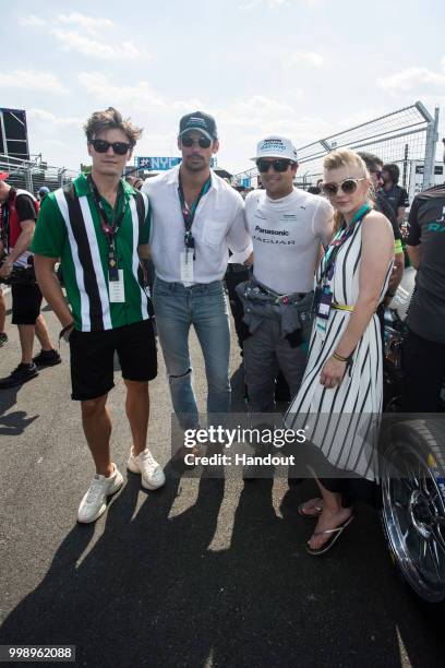 In this handout provided by FIA Formula E, Oliver Cheshire, David Gandy, Nelson Piquet Jr. , Panasonic Jaguar Racing, Jaguar I-Type II, and Natalie...