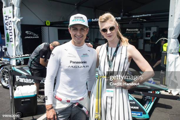 In this handout provided by FIA Formula E, Mitch Evans , Panasonic Jaguar Racing, Jaguar I-Type II, meets Natalie Dormer during the New York City...