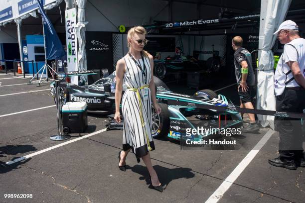 In this handout provided by FIA Formula E, Natalie Dormer visits the Jaguar Racing garage during the New York City ePrix, Round 11 of the 2017/18 FIA...