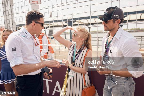 In this handout provided by FIA Formula E, James Barclay, Team Director, Jaguar Racing, meets Natalie Dormer and David Gandy during the New York City...
