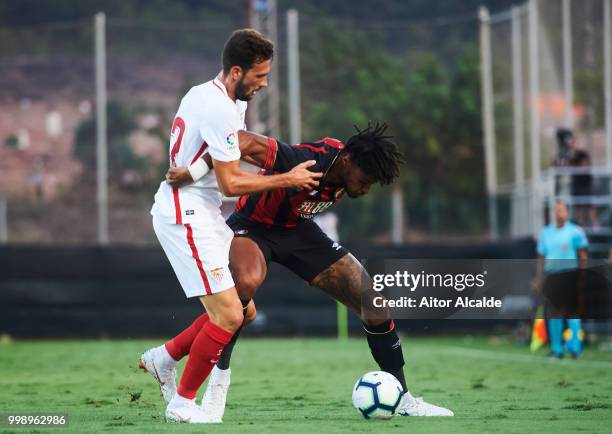 Franco Vazquez of Sevilla FC duels for the ball with Tyrone Mings of AFC Bournemouth during Pre- Season friendly Match between Sevilla FC and AFC...