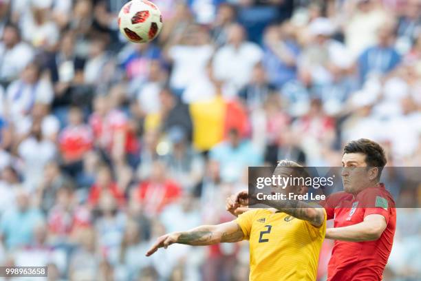 Harry Maguire of England wins a header from Toby Alderweireld of Belgium during the 2018 FIFA World Cup Russia 3rd Place Playoff match between...