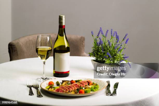 seafood salad with tuna on white tablecloth background - seafood salad stock pictures, royalty-free photos & images