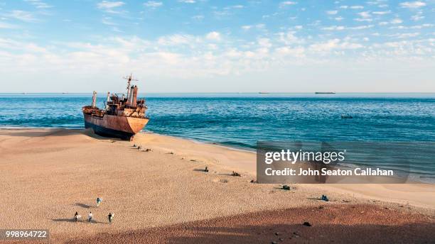 mauritania, shipwreck in the atlantic ocean - mauritania stock pictures, royalty-free photos & images
