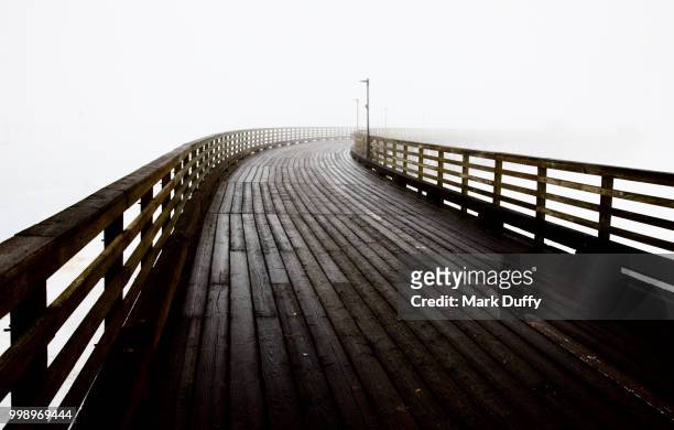 into the mist - mark duffy stock pictures, royalty-free photos & images