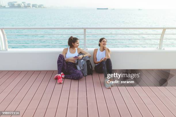 happy women after jogging - zoranm imagens e fotografias de stock