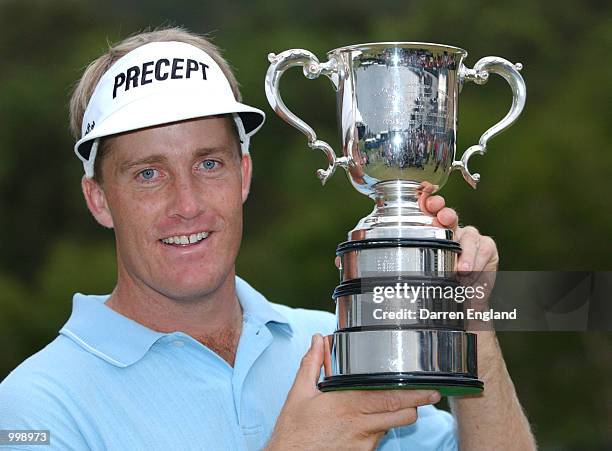 Stuart Appleby of Australia celebrates with the Stonehaven Cup after winning the Holden Australian Open Golf Tournament held at The Grand Golf Club,...