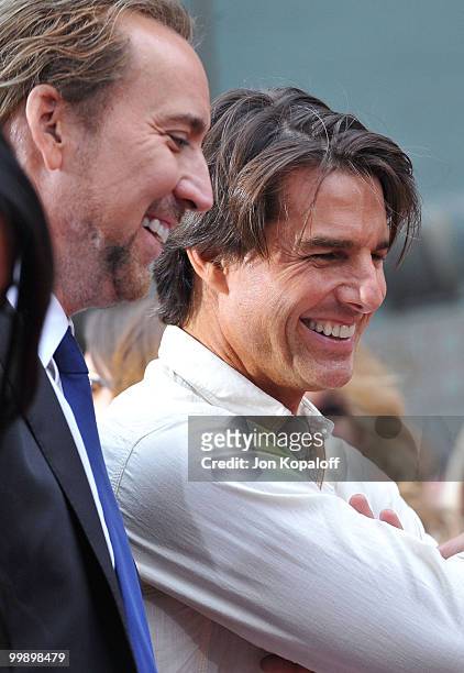 Actors Nicolas Cage and Tom Cruise attend the Handprint And Footprint Ceremony Honoring Producer Jerry Bruckheimer at Grauman's Chinese Theatre on...
