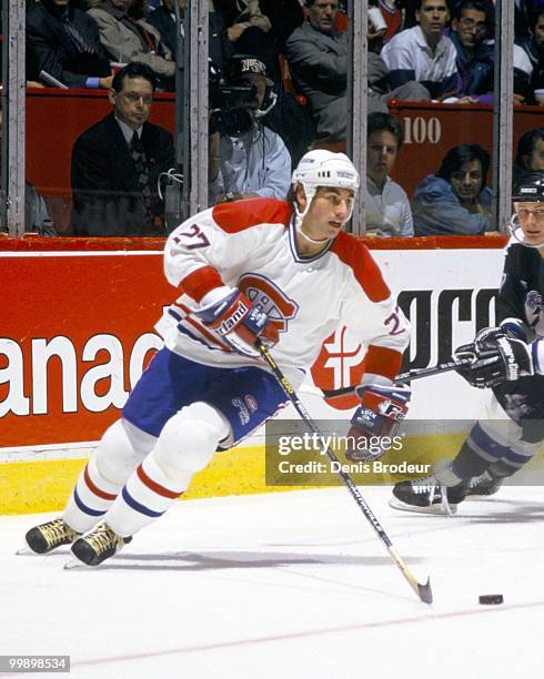 Mathieu Schneider of the Montreal Canadiens skates during the 1990's at the Montreal Forum in Montreal, Quebec, Canada. Schneider played for the...