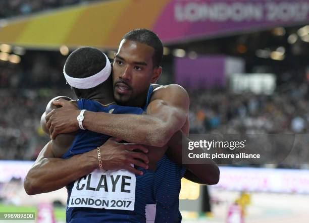 Triple jumper Chris Taylor from the USA huggig countryman Will Claye, who came only five centimeters short of him, thus winning the silver medal,...