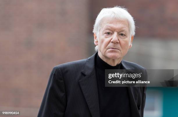 Anton Schlecker, former owner of a drug store chain, arrives to the Stuttgart regional court for the 20th hearing of his trial in Stuttgart, Germany,...