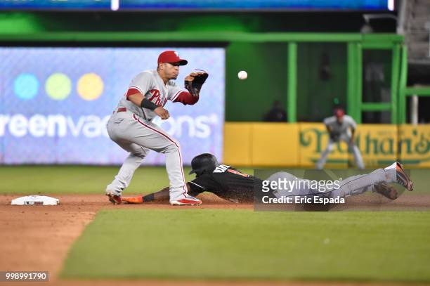 Cameron Maybin of the Miami Marlins steals second base during the seventh inning against the Philadelphia Phillies at Marlins Park on July 14, 2018...
