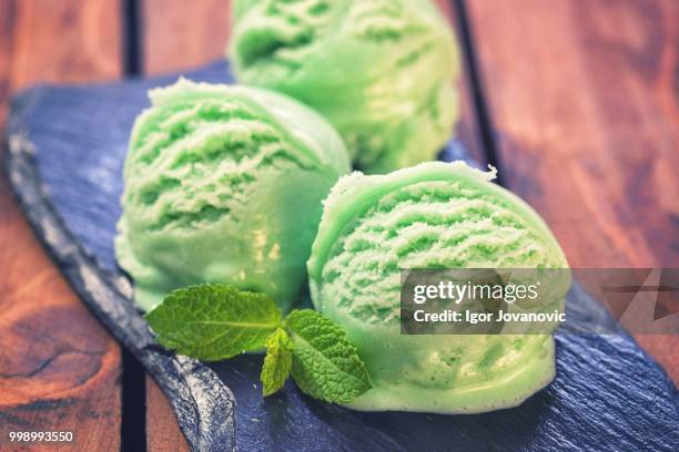 homemade pistachio or mojito ice cream - pistachio ice cream stock pictures, royalty-free photos & images