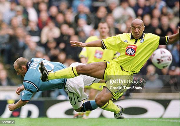 Birmingham City captain Martin O''Connor is tackled by Danny Tiatto of Manchester City during the Nationwide Division One match between Manchester...