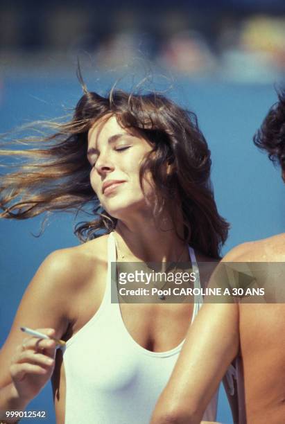La princesse Caroline de Monaco et Philippe Junot font du bateau le 3 décembre 1978 à la Martinique.