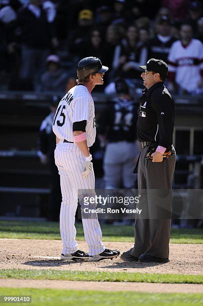 Gordon Beckham of the Chicago White Sox reacts after being called out on strikes against the Toronto Blue Jays on May 9, 2010 at U.S. Cellular Field...