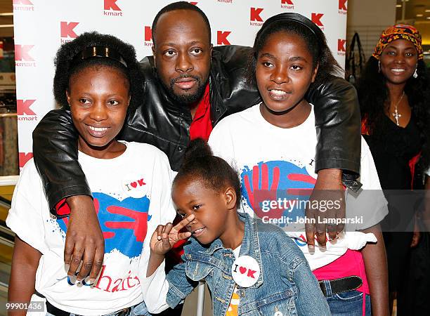 Claudinette Jean, Chantal Mori, Farah Maurice, Wyclef Jean and Margarette Pierre attend a charity shopping spree at Kmart on May 18, 2010 in New York...